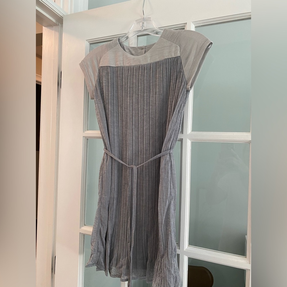 Girls size 10 grey pleated dress, with metallic detail. New with tags!